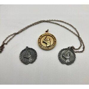 Three vintage women's South Central Softball League medals